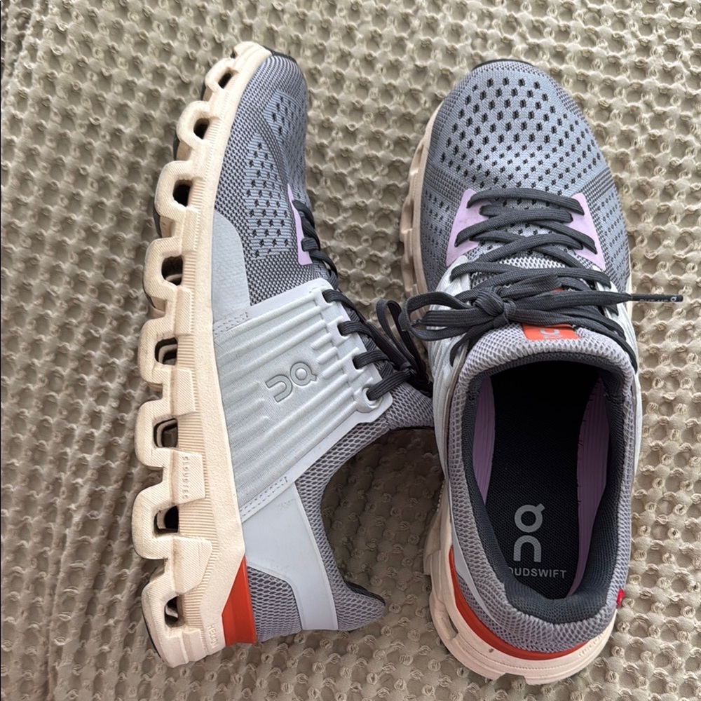 On Running Gray and Pink Athletic Shoes with Cloud Cushioning